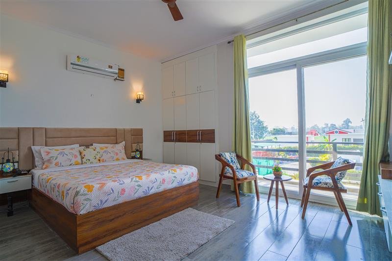 Luxury cottage bedroom at Hriday Bhoomi Jim Corbett